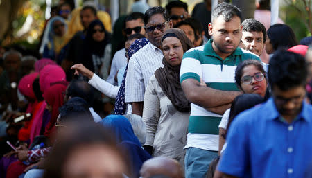 Maldivians living in Sri Lanka stand in line to cast their vote during the Maldives presidnetial election day at the Maldives embassy in Colombo, Sri Lanka September 23, 2018. REUTERS/Dinuka Liyanawatte