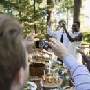 <p>We get it: You really want to show off how much you love the newlyweds with their adorable Instagram hashtag<em> but</em> experts say it's best to wait until after they say "I do." "Guests should refrain from taking photos or videos during the ceremony, if the couple asked them to," says Shawna Orwoll from <a href="https://www.awaywegoweddings.com/" rel="nofollow noopener" target="_blank" data-ylk="slk:Away We Go Weddings;elm:context_link;itc:0;sec:content-canvas" class="link ">Away We Go Weddings</a>. "Religious or not, a wedding ceremony is a sacred moment for the couple and should be treated accordingly." </p>