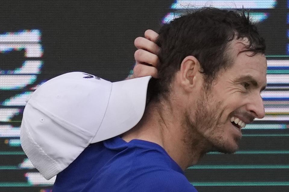 Andy Murray of Great Britain reacts after losing a ball to Denis Shapovalov of Canada during a match of the Dubai Duty Free Tennis Championships in Dubai, United Arab Emirates, Monday, Feb. 26, 2024. (AP Photo/Kamran Jebreili)