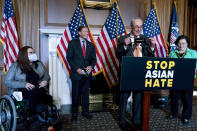 Senate Majority Leader Chuck Schumer of N.Y., accompanied by Sen. Mazie Hirono, D-Hawaii, Sen. Tammy Duckworth, D-Ill., and Sen. Richard Blumenthal, D-Conn., speaks at a news conference after the Senate passed a COVID-19 Hate Crimes Act on Capitol Hill, Thursday, April 22, 2021, in Washington. (AP Photo/Andrew Harnik)