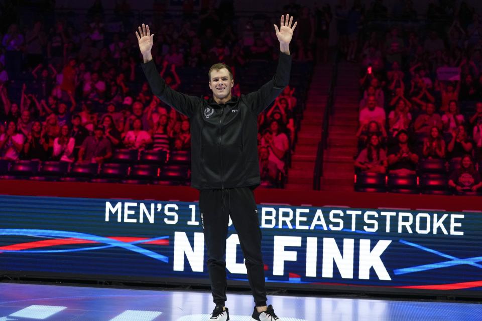 Nic Fink reacts after winning the men's 100 breaststroke finals Sunday, June 16, 2024, at the US Swimming Olympic Trials in Indianapolis. (AP Photo/Michael Conroy)