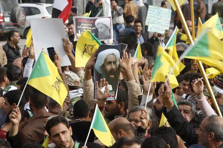 Shi'ites protest against the execution of Shi'ite Muslim cleric Nimr al-Nimr in Saudi Arabia, during a demonstration in Baghdad January 6, 2016. REUTERS/Khalid al Mousily