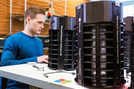 Microsoft Researcher Ethan Jackson works on the AI technology that the drives Project Premonition mosquito trap in this handout photo obtained by Reuters June 30, 2017. Microsoft/Handout via REUTERS