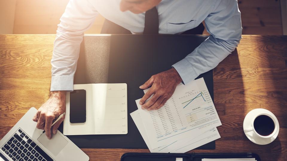 financial consultant sitting at desk