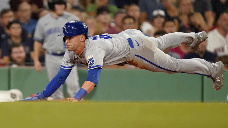 Kansas City Royals' Drew Waters scores on a double by Kyle Isbel against the Boston Red Sox during the seventh inning of a baseball game Tuesday, Aug. 8, 2023, in Boston. (AP Photo/Steven Senne)