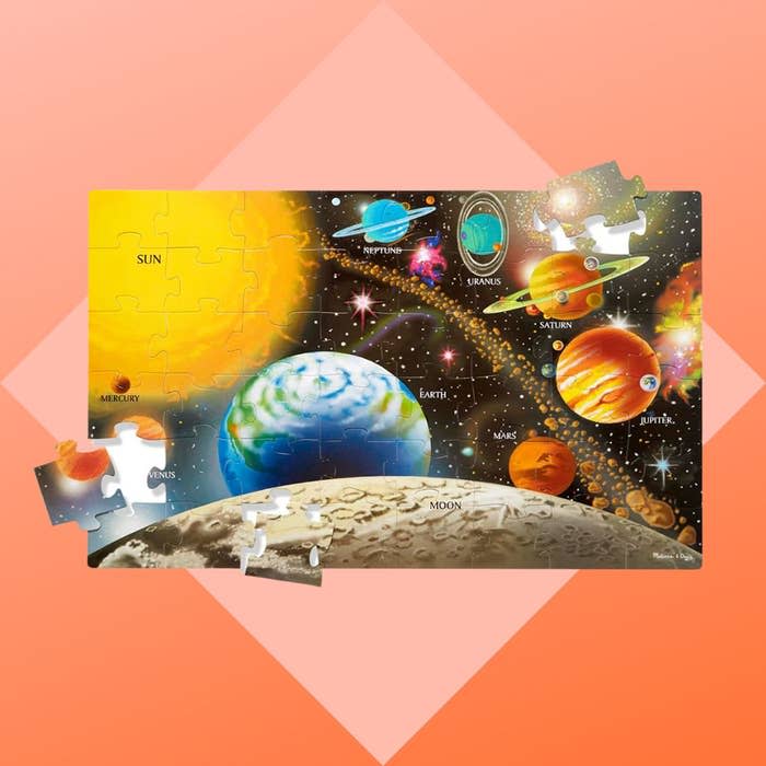 Made with 48 thick cardboard pieces, this beautiful puzzle features dazzling original artwork of our solar system. It's easy to wipe clean and put together, and helps to promote hand-eye coordination while also teaching kids about the planets and stars. It's a great screen-free option for kids between the ages of 3 and 6.You can buy the solar system puzzle from Amazon for around $9. 