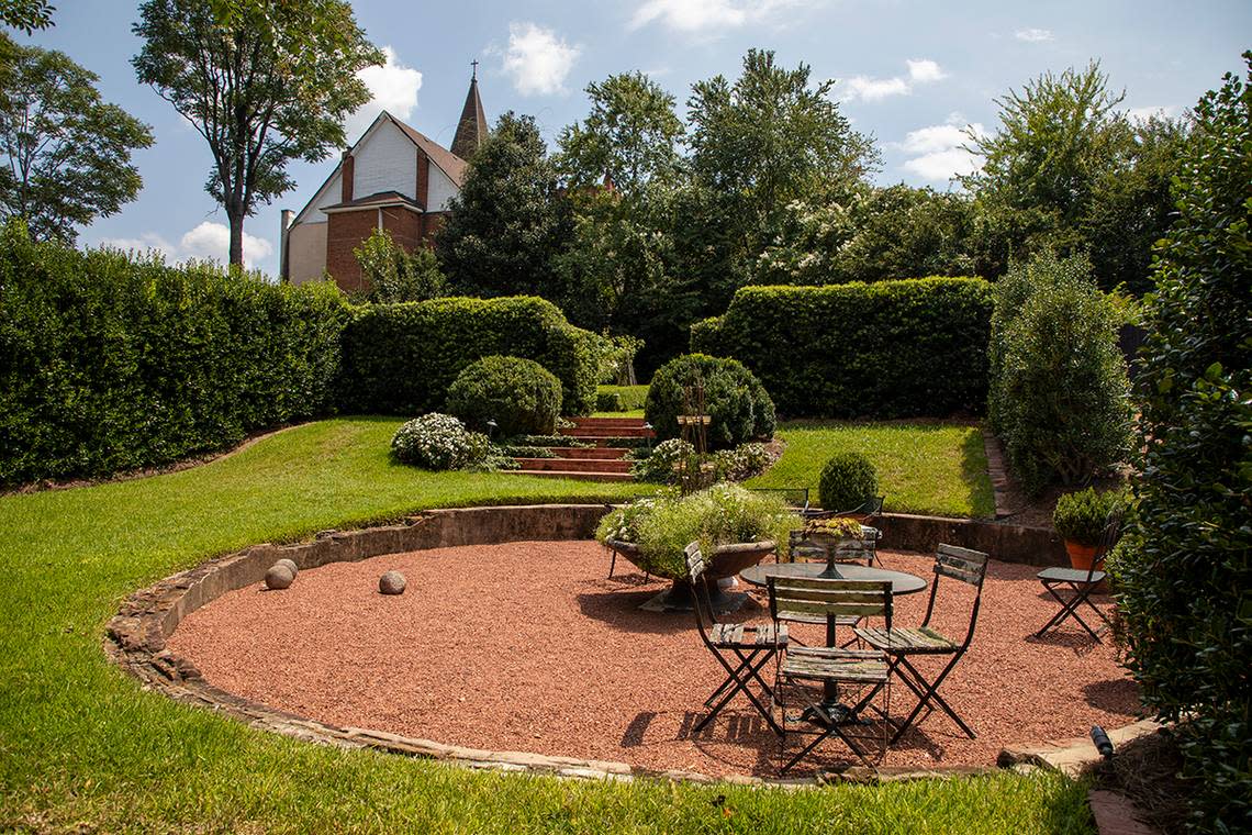 In their backyard, Carey Pickard and Chris Howard found a deep 30’x30’ cistern that had at one time held the city of Macon’s water supply. They excavated a few feet of it and it is now a hardscape for their garden. (Photo by Evey Wilson Wetherbee)