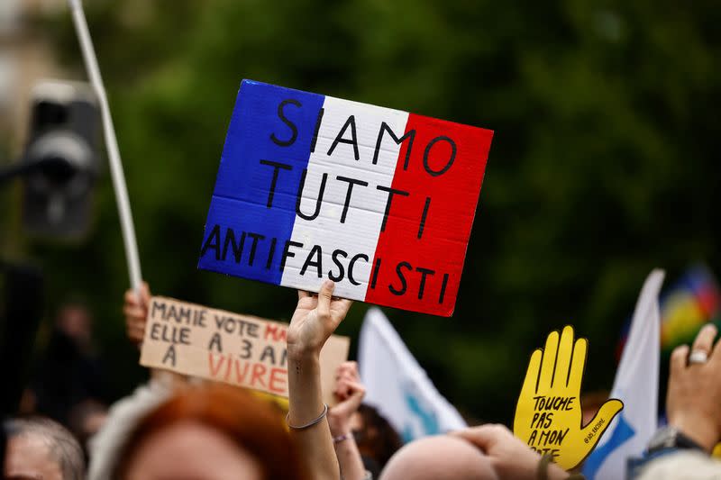 People protest against the French far-right Rassemblement National party, in Paris