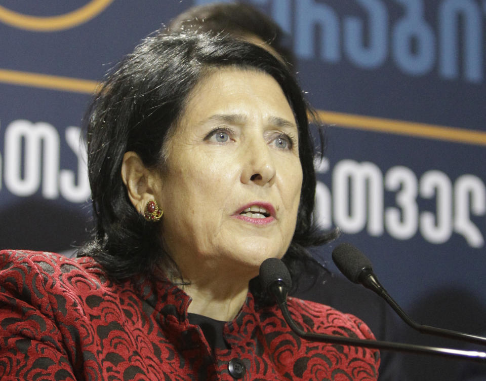 Salome Zurabishvili, former Georgian Foreign minister and presidential candidate, speaks during a news briefing dedicated to the results of the presidential election at her campaign headquarter in Tbilisi, Georgia, Wednesday, Nov. 28, 2018. Two of Georgia's former foreign ministers are facing off against each other Wednesday in a tight runoff that will mark the last time Georgians elect their head of state by popular vote. (AP Photo/Shakh Aivazov)