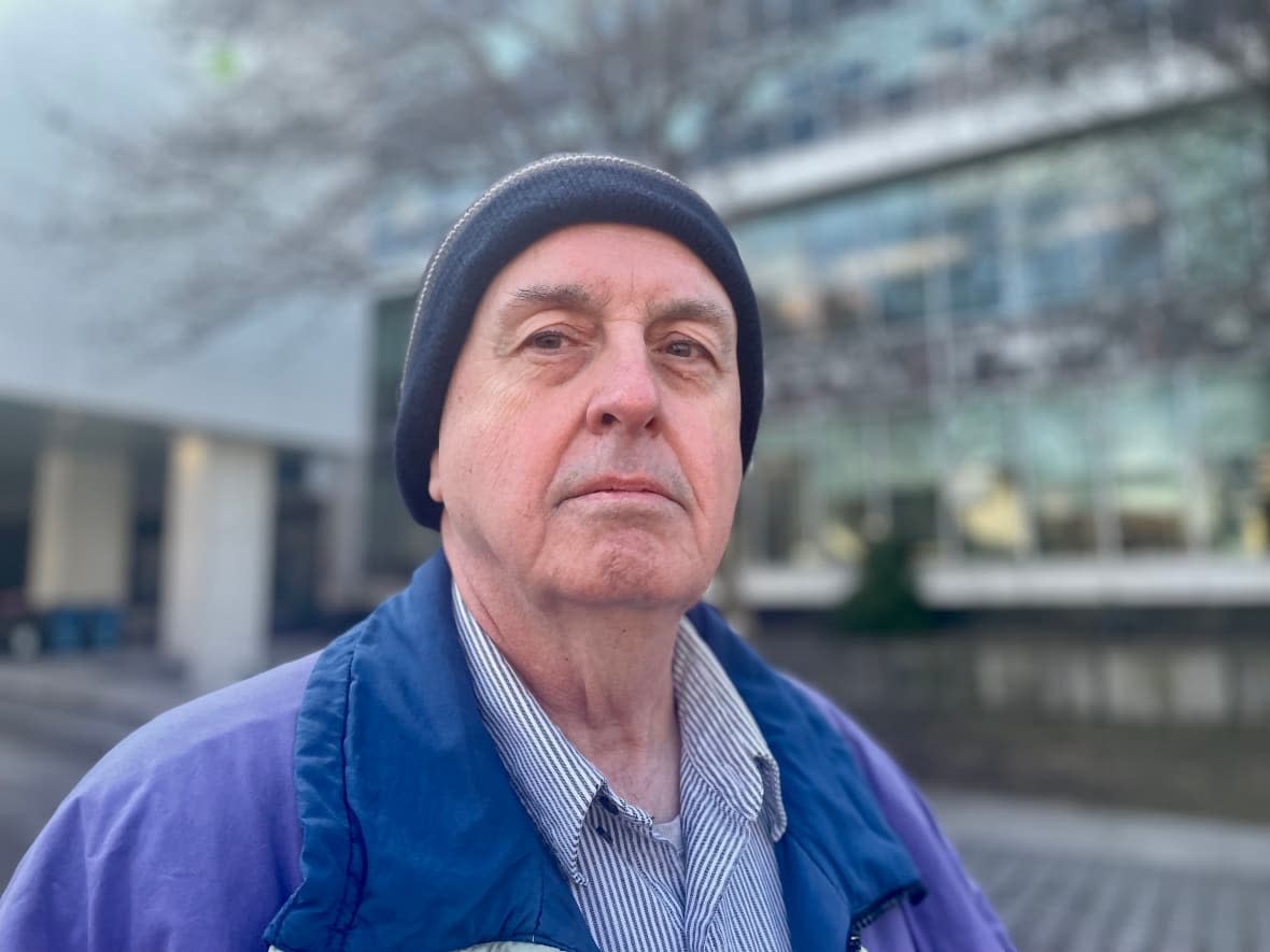 David Galvin is a tenant at 1083 Main St. E, in Hamilton, where there has been no running water since late December, forcing Galvin to drive to a motel to shower.   (Samantha Beattie/CBC - image credit)