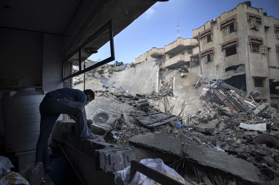 Image: A six-story building n Gaza City that was destroyed by an early morning Israeli airstrike (Khalil Hamra / AP)