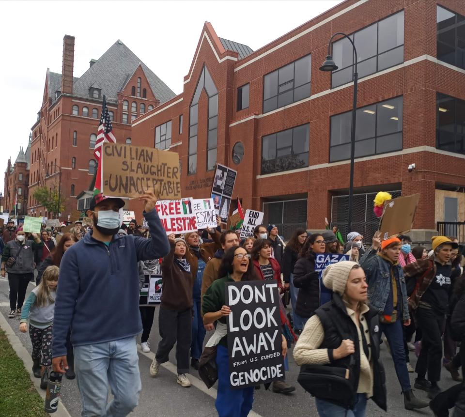 Palestine supporters march through Burlington to protest the Israeli government's "genocidal" actions after Hamas killed approximately 1,200 people in an Oct. 7 attack near the Gazan border. Protestors called for an immediate ceasefire.