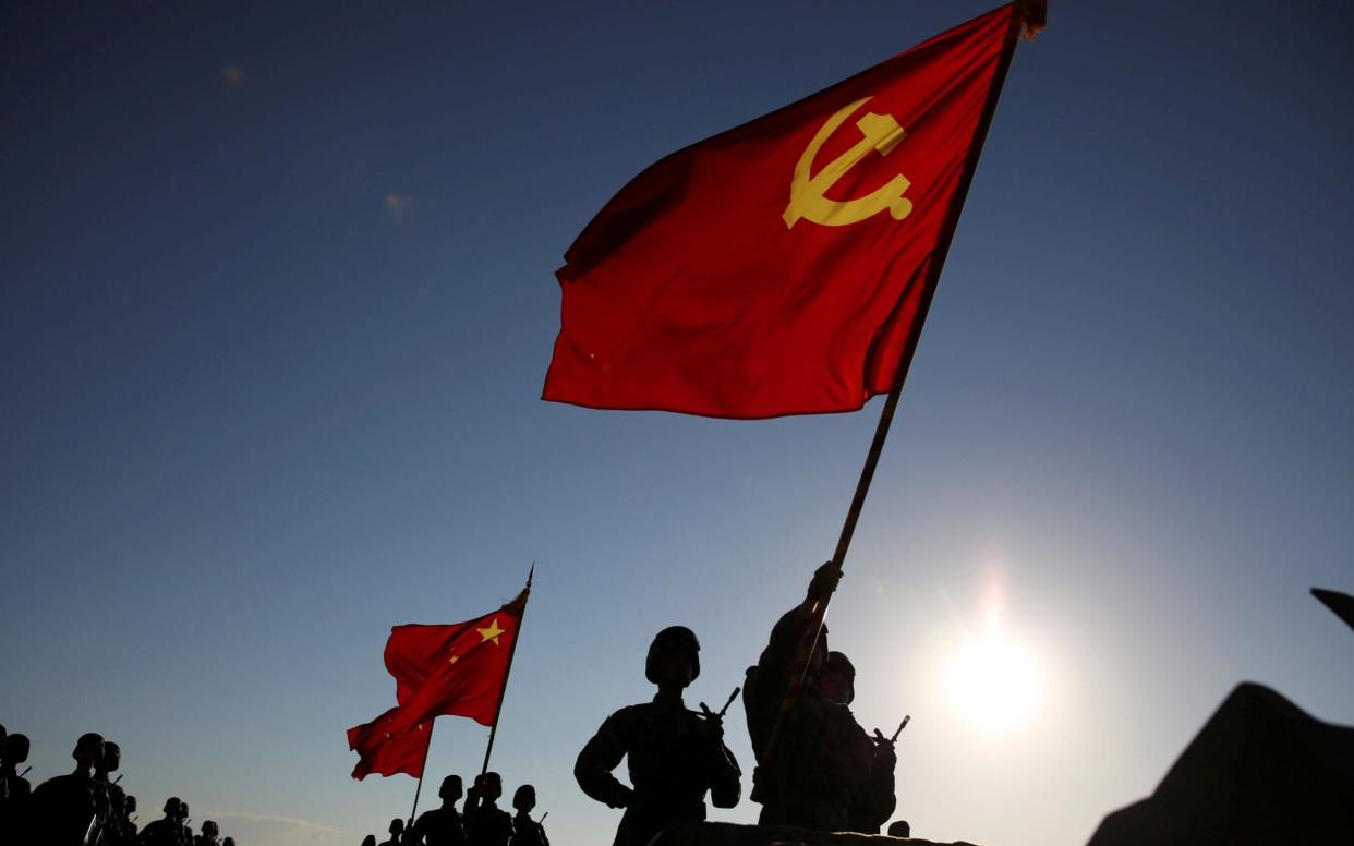 Soldiers commemorate the 90th anniversary of the foundation of China's People's Liberation Army (PLA) at Zhurihe military base in Inner Mongolia Autonomous Region - REUTERS