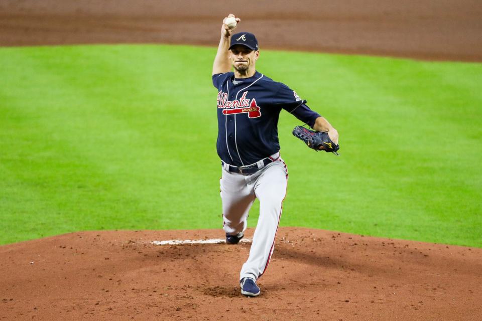 Charlie Morton #50 of the Atlanta Braves looks on against the Houston Astros during the second inning in Game One of the World Series at Minute Maid Park on October 26, 2021 in Houston, Texas