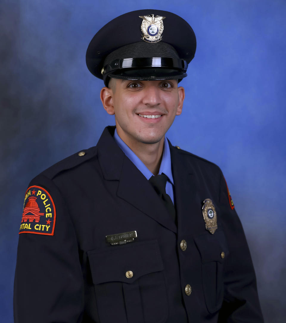 This photo provided by the Raleigh Police Department shows Officer Gabriel Torres, one of the victims of a shooting attack that stretched from the streets of a Raleigh neighborhood to a nearby walking trail last Thursday. (The Raleigh Police Department via AP)