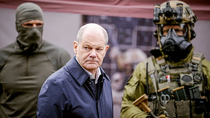 German Chancellor Olaf Scholz, center, visits the Territorial Disposition Group capability demonstration, at Cologne-Wahn military airport, in Cologne, 23 October 2023 23