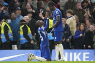 Chelsea's Nicolas Jackson, left, celebrates after scoring his side's second goal during the English Premier League soccer match between Chelsea and Tottenham Hotspur at Stamford Bridge stadium in London, Thursday, May 2, 2024. (AP Photo/Kirsty Wigglesworth)