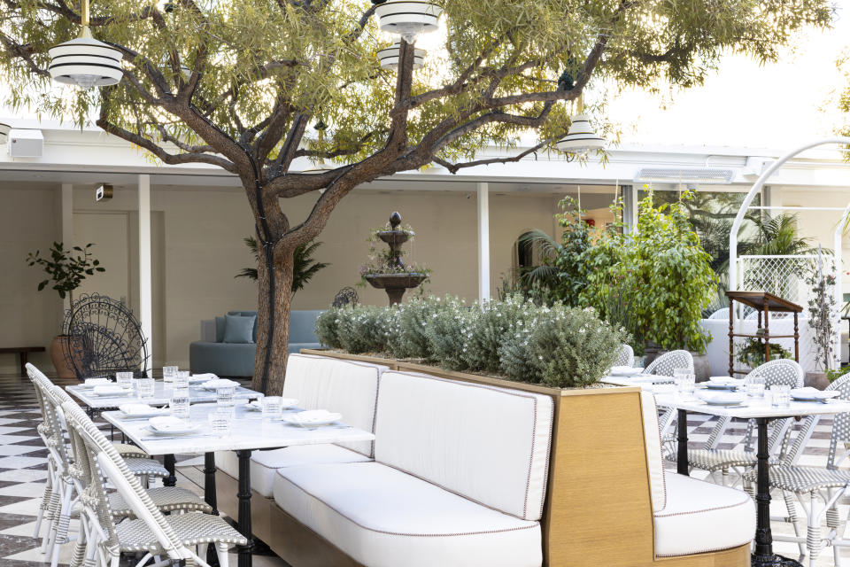 Outdoor dining area at Short Stories Hotel. - Credit: Stefan Merriweather