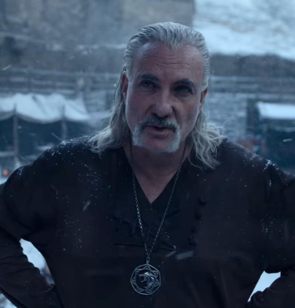 Kim Bodnia as Vesemir stands in the snow in "The Witcher"