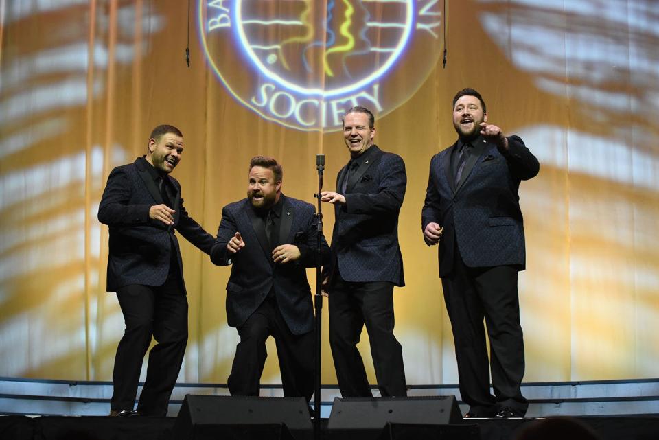 Barbershop quartet Quorum competes at the 2022 International Quartet Contest in Charlotte, North Carolina. The group includes baritone Nathan Johnston of Fort Myers (far right).