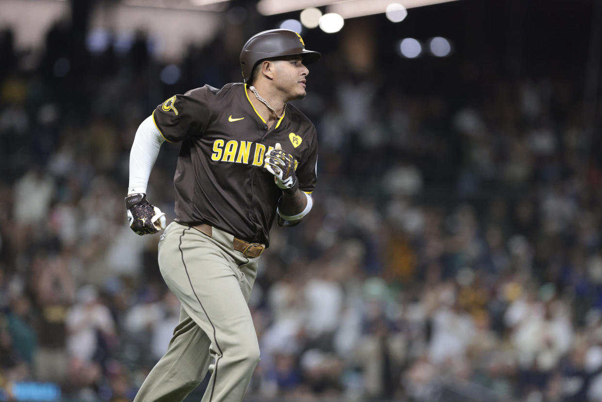 San Diego Padres' Manny Machado jogs the bases after hitting a two-run home run off Seattle Mariners starting pitcher George Kirby during the sixth inning of a baseball game, Tuesday, Sept. 10, 2024, in Seattle. (AP Photo/Jason Redmond)