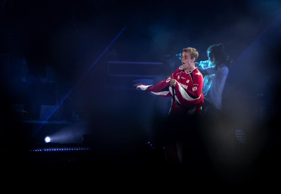 Canadian pop star Justin Bieber performs at a concert marking the end of Formula One, in Jiddah, Saudi Arabia, Sunday, Dec. 5, 2021. (AP Photo/Amr Nabil)