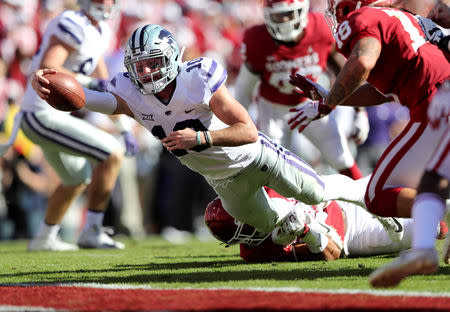 Oct 27, 2018; Norman, OK, USA; Kansas State Wildcats quarterback Skylar Thompson (10) dives for a touchdown during the second quarter against the Oklahoma Sooners at Gaylord Family - Oklahoma Memorial Stadium. Mandatory Credit: Kevin Jairaj-USA TODAY Sports