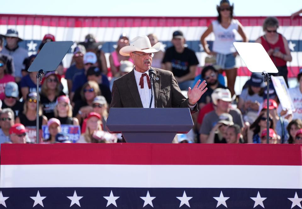 Secretary of State candidate Mark Finchem speaks to people gathered at Legacy Sports Park on Oct. 9, 2022, to rally for Kari Lake, Blake Masters and other of former President Donald Trump's ticket republican candidates.