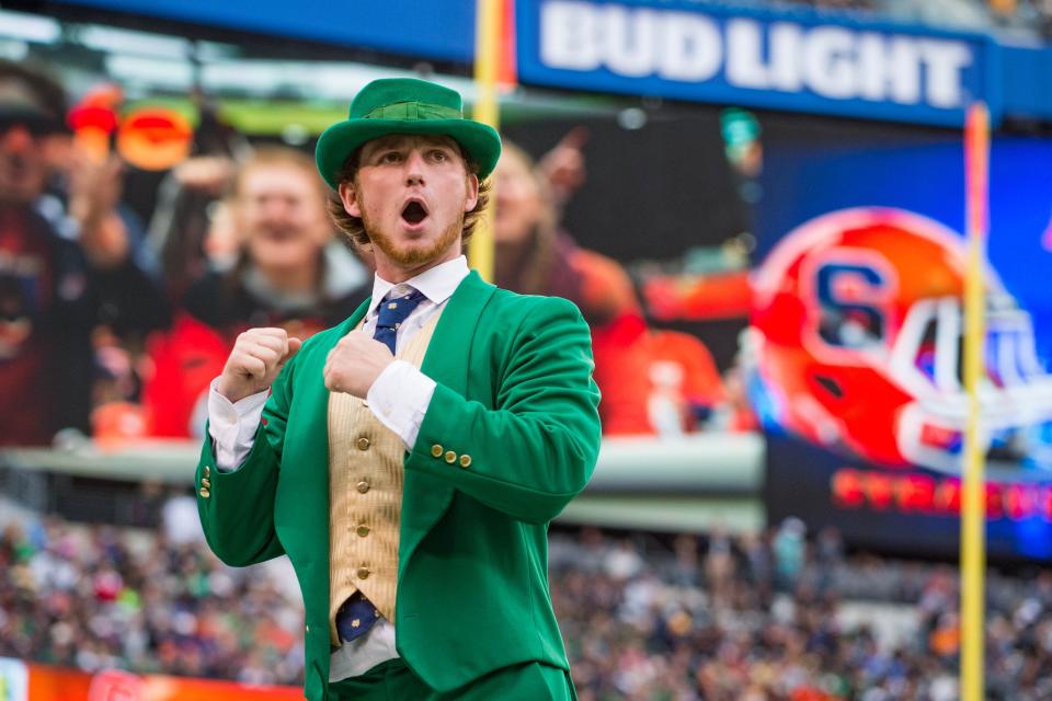 The Notre Dame Leprechaun cheers in the third quarter of the game between the Notre Dame Fighting Irish and the Syracuse Orange at MetLife Stadium. Notre Dame won 50-33.