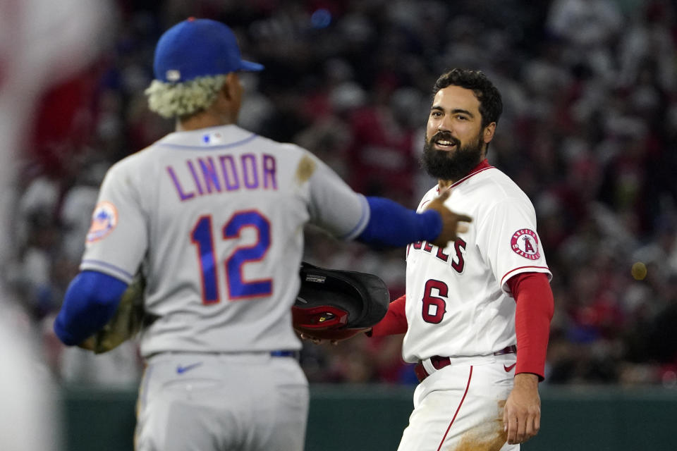 New York Mets shortstop Francisco Lindor, left, and Los Angeles Angels' Anthony Rendon exchange words after Rendon was forced out at second on a hit by Brandon Marsh to end the fifth inning of a baseball game Friday, June 10, 2022, in Anaheim, Calif. (AP Photo/Mark J. Terrill)