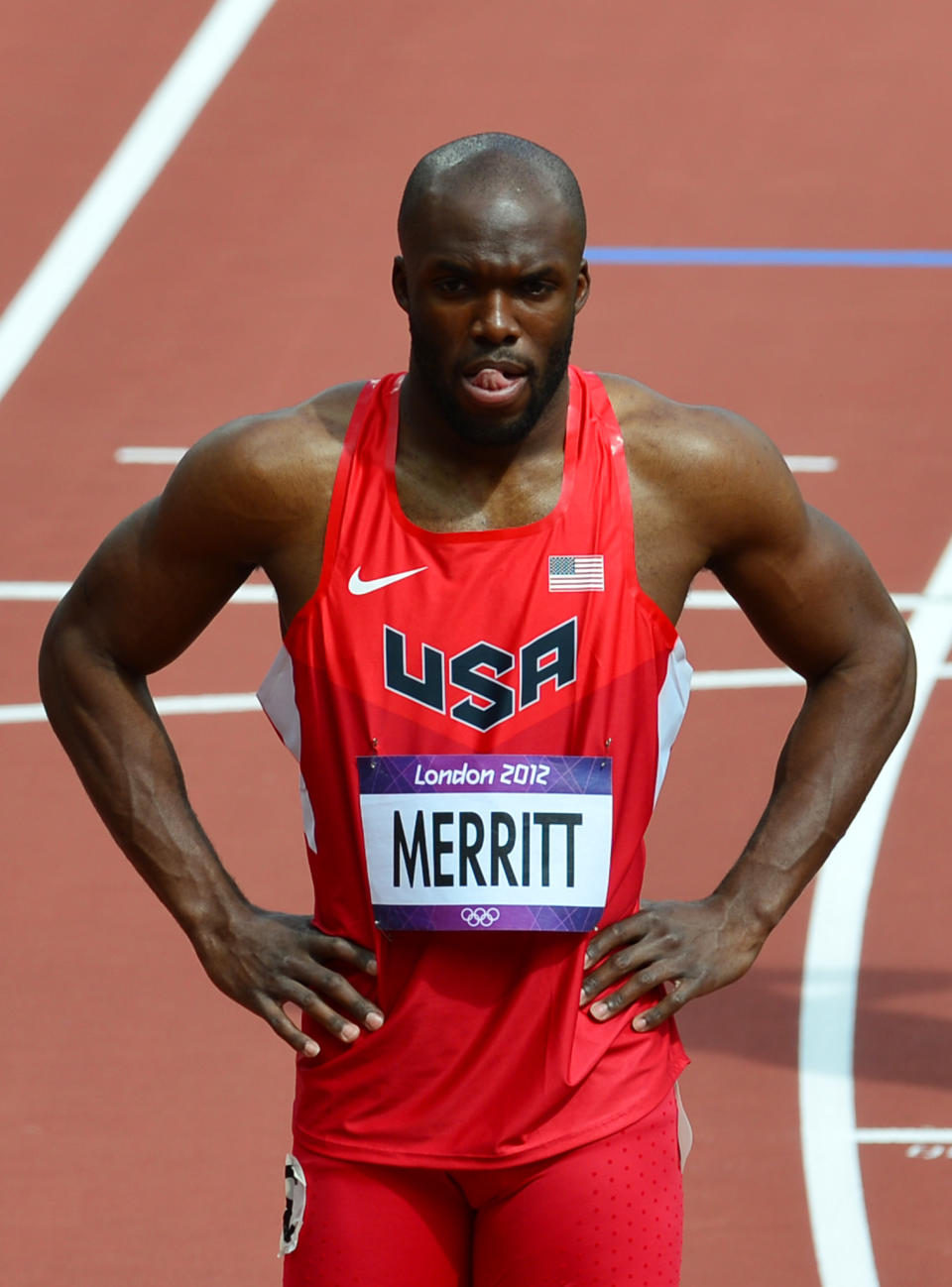 US' Lashawn Merritt looks dejected after pulling up from the men's 400m heats at the athletics event during the London 2012 Olympic Games on August 4, 2012 in London. AFP PHOTO / GABRIEL BOUYSGABRIEL BOUYS/AFP/GettyImages