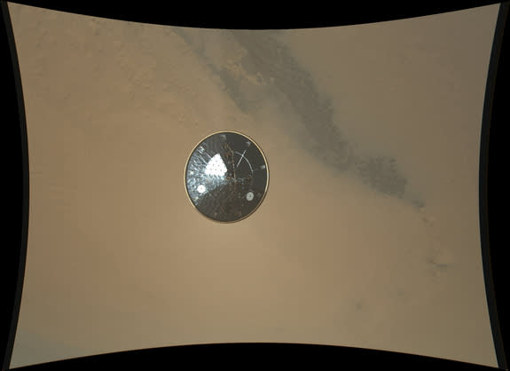 This color full-resolution image showing the heat shield of NASA's Curiosity rover was obtained during descent to the surface of Mars on Aug. 5 PDT (Aug. 6 EDT). The 15-foot heat shield was photographed by Curiosity's MARDI descent camera.