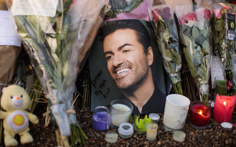 The shrine outside George Michael's house in the days after his death - Credit: Jack Taylor/Getty Images