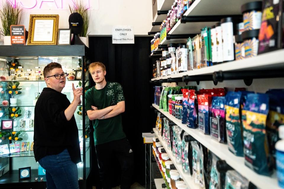 Chief Operating Officer Sabrina Bergloff talks with Connor Stobbe at the Despensary, 221 4th St., on Friday, September 29, 2023 in Des Moines.