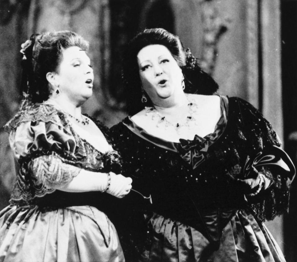 FILE - In this Sunday, May 19, 1985 file photo, opera singers Marilyn Horne, left, and Montserrat Caballe perform at the Royal Opera of Versailles Palace in Paris. Spanish opera diva Montserrat Caballe, renowned for her bel canto technique and her interpretations of the roles of Rossini, Bellini and Donizetti, has died. She was 85. Hospital Sant Pau press officer Abraham del Moral confirmed her passing away early on Saturday Oct. 6, 2018. (AP Photo, File)