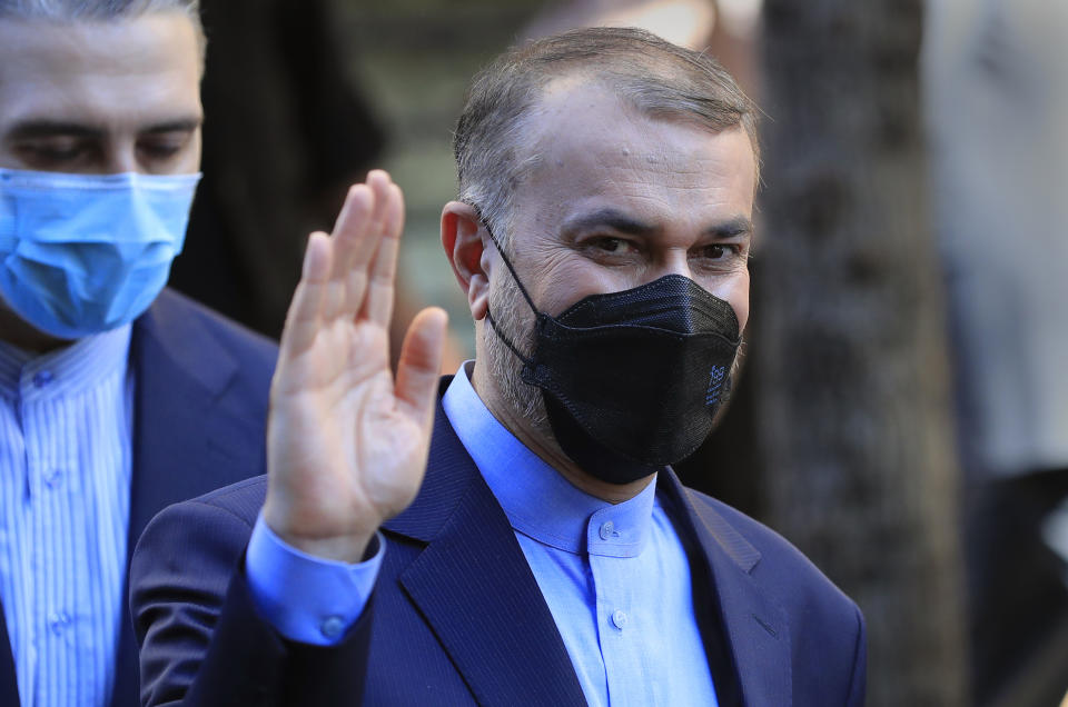 Iranian Foreign Minister Hossein Amirabdollahian, waves as he leaves after his meeting with his Lebanese counterpart Abdullah Bou Habib in Beirut, Lebanon, Thursday, Oct. 7, 2021. Amirabdollahian said he discussed with officials in Beirut the "positive" effects of ongoing talks between Iran and Saudi Arabia, and blamed foreign troops based in the Middle East for regional instability. (AP Photo/Hussein Malla)