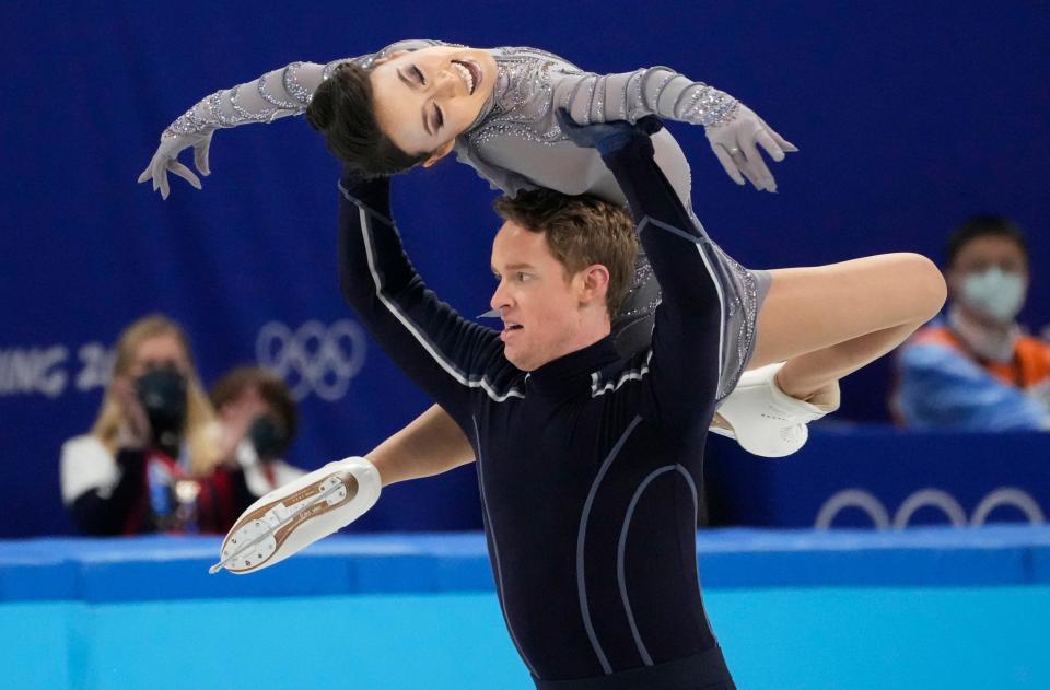 Americans Madison Chock and Evan Bates perform in the ice dance free dance portion of the figure skating mixed team final during the 2022 Olympics.