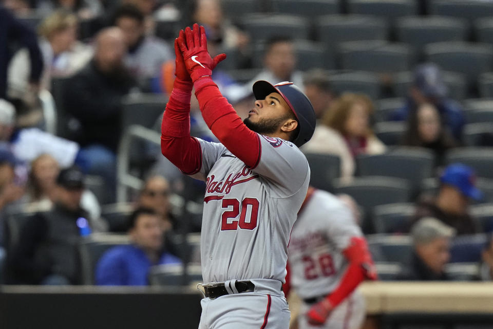 Washington Nationals' Keibert Ruiz gestures after hitting a home run against the New York Mets during the second inning of a baseball game Tuesday, April 25, 2023, in New York. (AP Photo/Frank Franklin II)