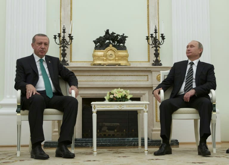 It remains unclear if Russian President Vladimir Putin (R) gave his Turkish counterpart Recep Tayyip Erdogan the slightest inkling of his plan for the Syrian intervention when they met in Moscow on September 23, 2015