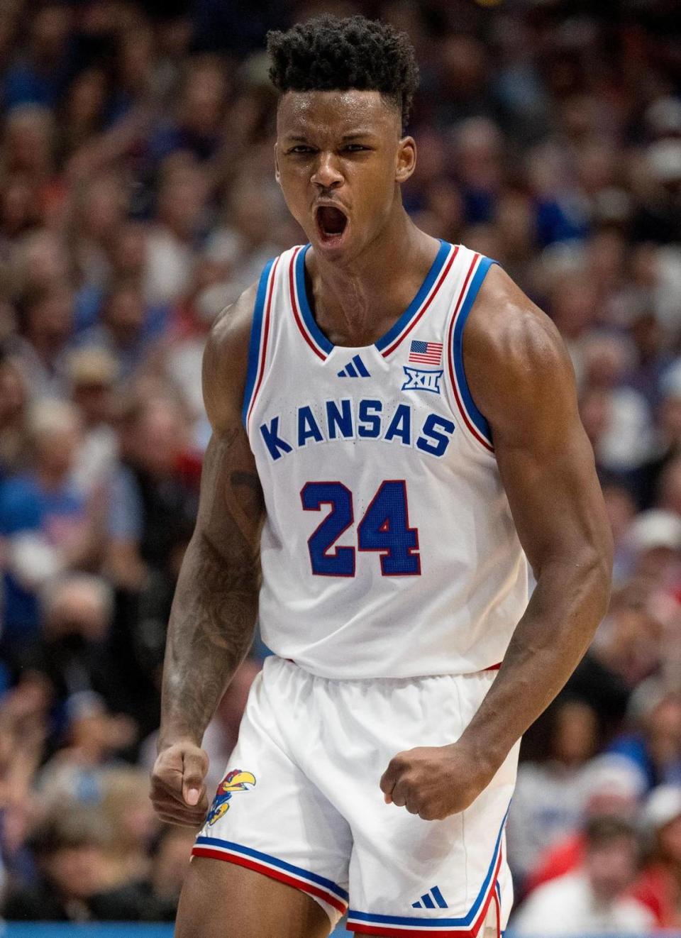 Kansas Jayhawks forward K.J. Adams Jr. (24) celebrates a score during an NCAA basketball game against the Texas Longhorns on Saturday, Feb. 24, 2024, in Lawrence.