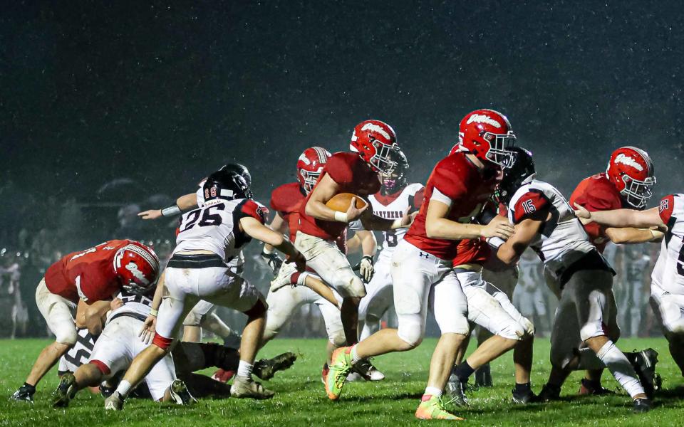 Cael Harter (4) gallops through the middle of the Panthers defense. Annville-Cleona played host to the Schuylkill Valley Panthers in a LL League Football game on Friday October 20, 2023. Schuylkill Valley beat Annville-Cleona, 14-13.