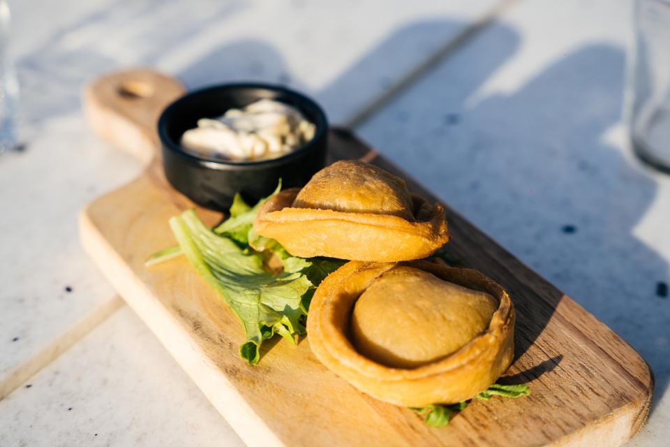 Verdura Empanadas with spinach, garlic and Chihuahua and Oaxaca cheeses will be featured on National Empanada Day at Unidos Latin Kitchen + Bar in downtown Naples.