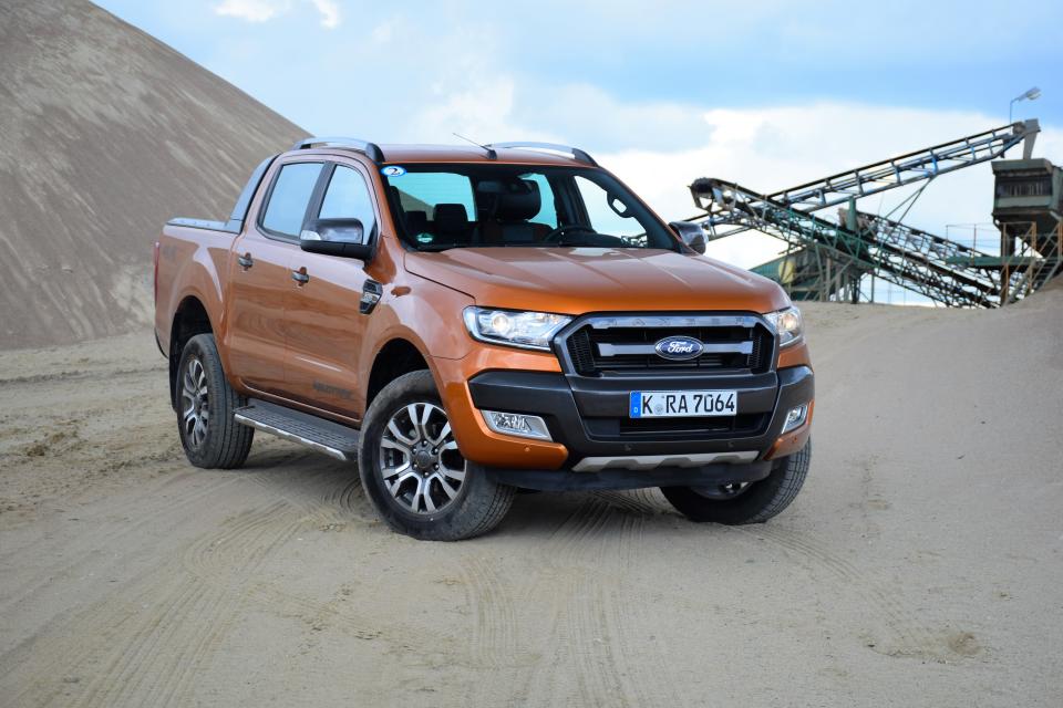 Pultusk, Poland - April, 25th, 2015: Ford Ranger Wildtrack stopped on the unmade road. The newest generation of Ranger was debut in 2011 on the market. The Ranger is powered by 2,2-litre diesel engine (pushing out 130 HP and 160 HP) or V6, 3.2-litre diesel engine (200HP).