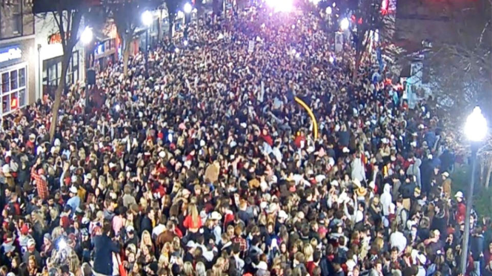 Alabama Crimson Tide fans celebrate on 'The Strip' in big numbers.