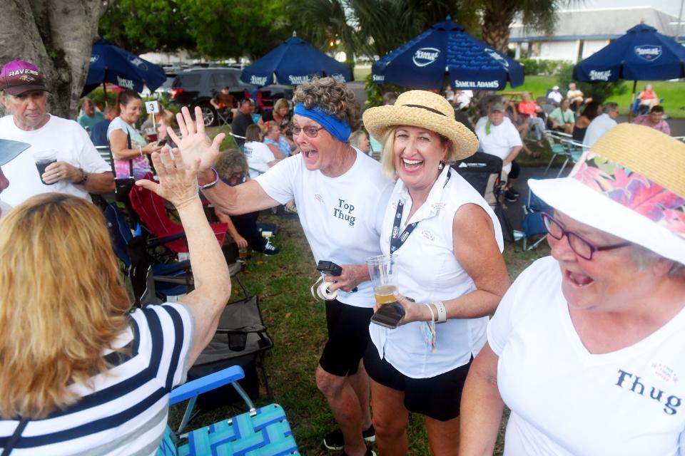 Tracey Cole (center left) and Brenda Harris cheer with friends and community members on Tuesday, Sept. 15, 2020, after the first unofficial results from the Sebastian recall election were posted during a watch party at Pareidolia Brewing Company in Sebastian. Voters decided to remove City Council members Damien Gilliams, Charles Mauti and Pamela Parris from office and replace them with Christopher Nunn, Bob McPartlan and Fred Jones. Cole started a grass-roots organization called ""Sebastian Voters Against Gilliams and Parris" to make people aware that they have choice in who leads the community. "The main goal of the recall is to let people know they deserve better, and if you have a city council that's not representing you, that's breaking the law and that has their own agenda, your not stuck with that for two years," said Cole. The new council members are to take office Sept. 23.