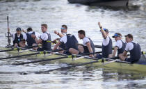 Oxford Men's crew celebrate their victory over Cambridge after the Men's Boat Race on the River Thames, in London, Sunday April 2, 2017. (Steven Paston/PA Wire via AP)