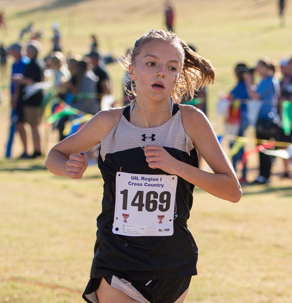 Lubbock High's Reese Peña crosses the finish line at the Region I-5A cross country meet Monday, Oct. 23, 2021, at Mae Simmons Park in Lubbock.