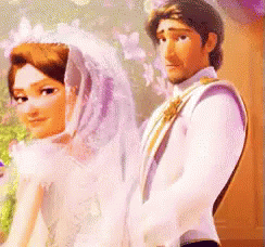 A Disney bride and groom looking shocked