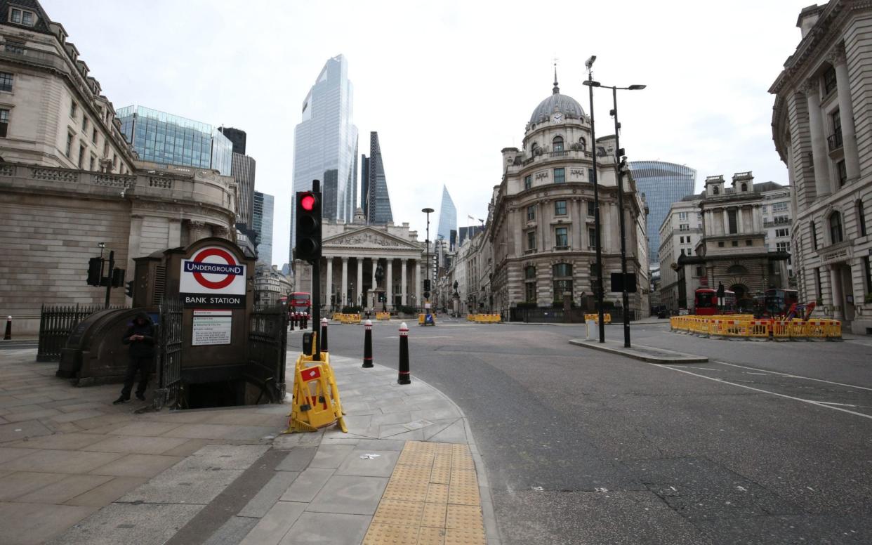 Empty streets around Bank Underground station in London, during the lockdown - Jonathan Brady/PA