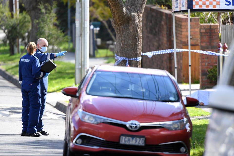 Foresnsic investigators at the scene in Kilsyth. Source: AAP